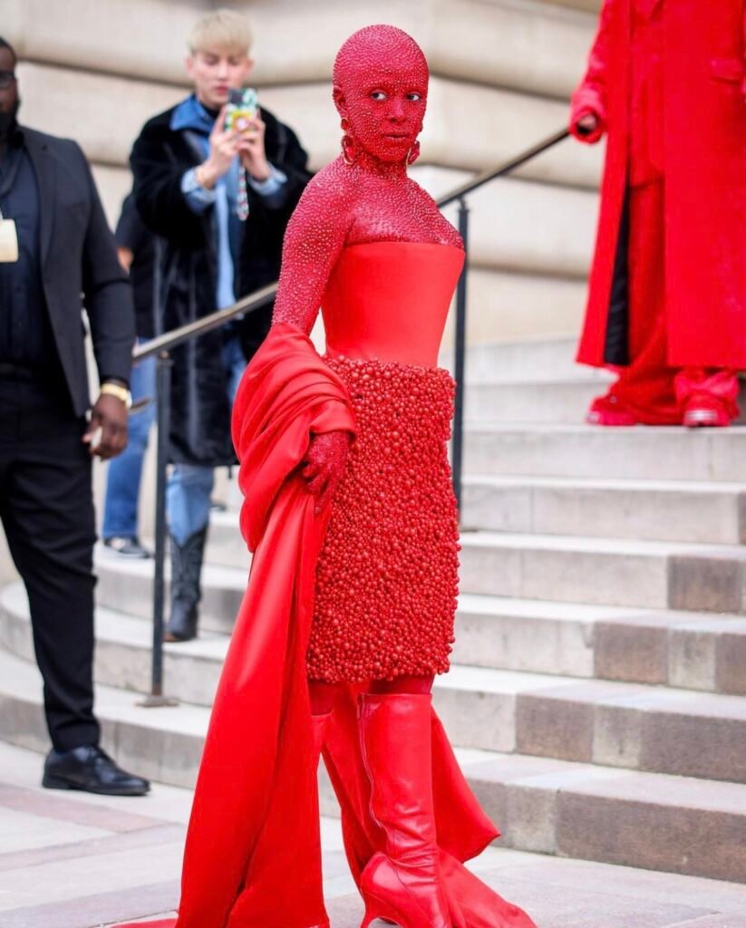 Doja Cat Sparkles in Schiaparelli at Paris Haute Couture Week in Full Red Body Paint and 30,000 Crystals
