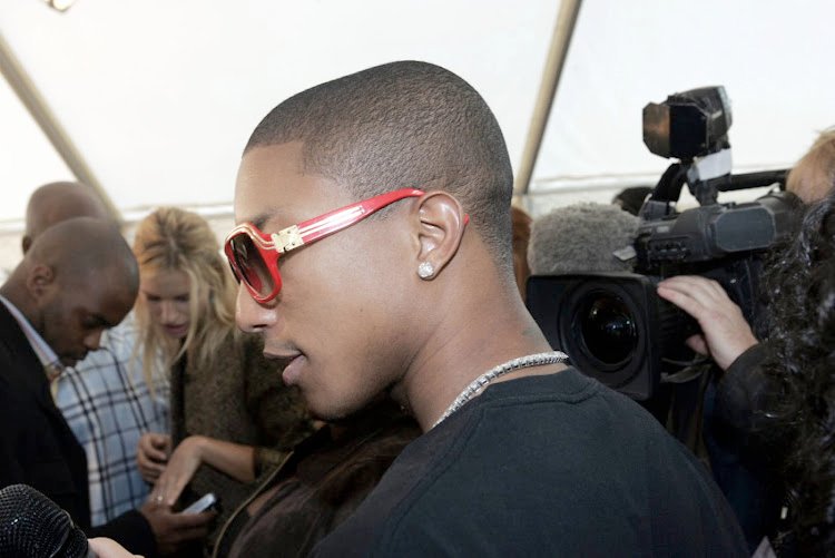 Pharrell Williams in a pair of Millionaire sunglasses.
Image: Getty/Michel Dufour